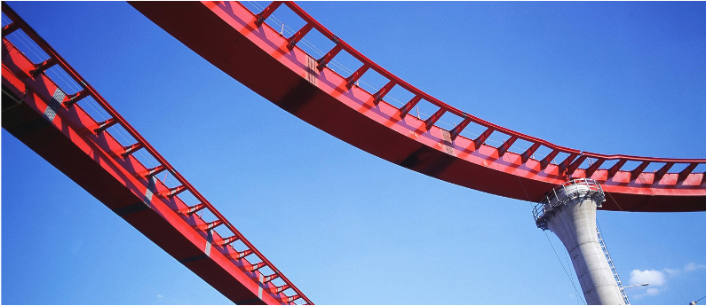 A rollercoaster on a blue sky background. For Massage Therapy treatments call AMBI.